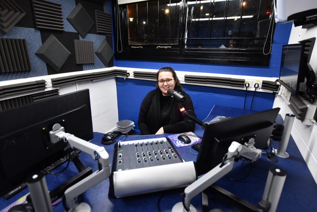 custom blue edit desk inside radio studio