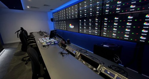 NEP control room with multiple monitor displays on wall